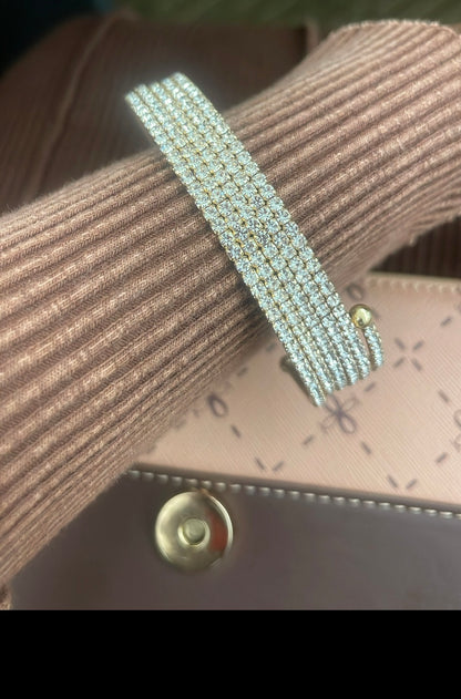 The Transformation Bangle, gold multi-row rhinestone coil bangle
